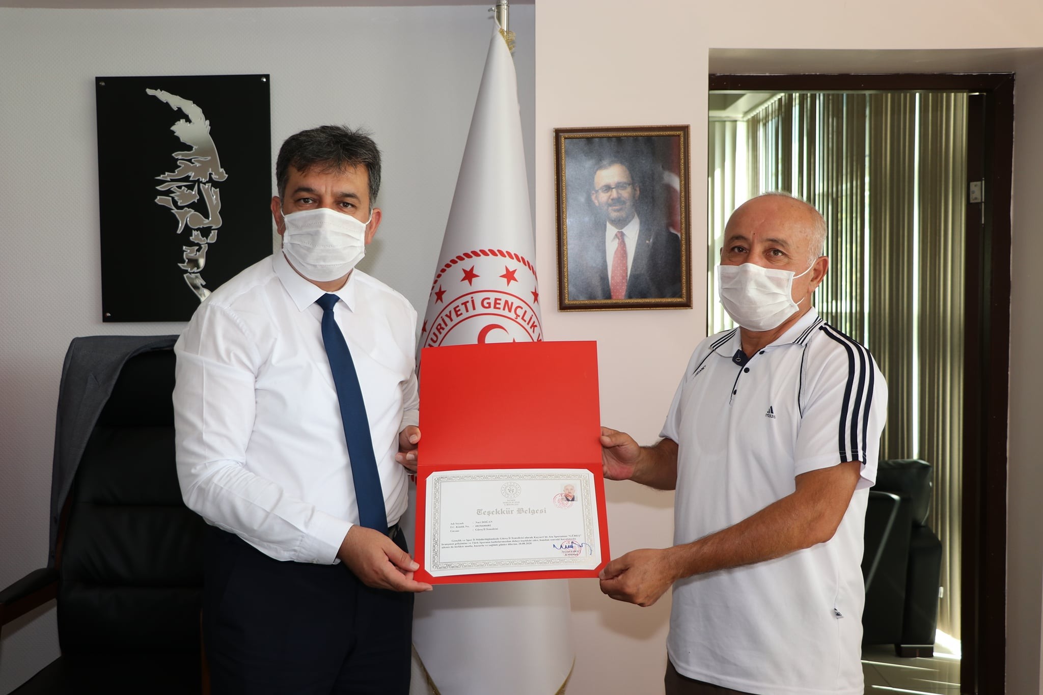 Eskici’den Naci Doğan’a teşekkür belgesi